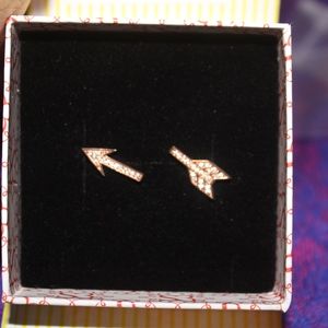 rose gold spear earrings